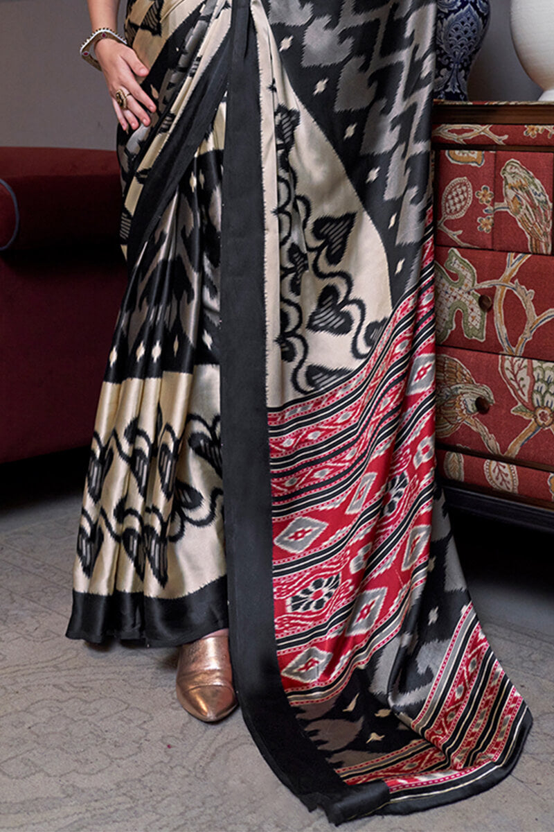 Beige and Black Patola Printed Satin Crepe Silk Saree