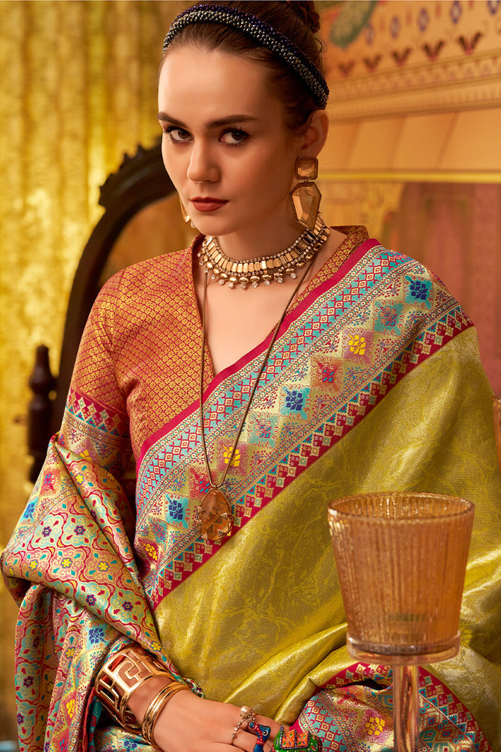 Dull Yellow Zari Woven Tissue Silk Saree