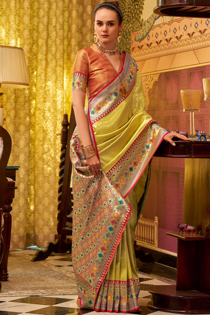 Dull Yellow Zari Woven Tissue Silk Saree