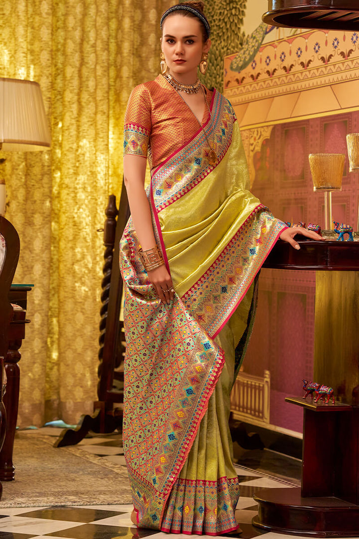Dull Yellow Zari Woven Tissue Silk Saree