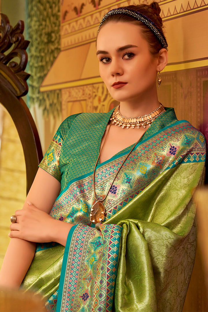Icky Green Zari Woven Tissue Silk Saree