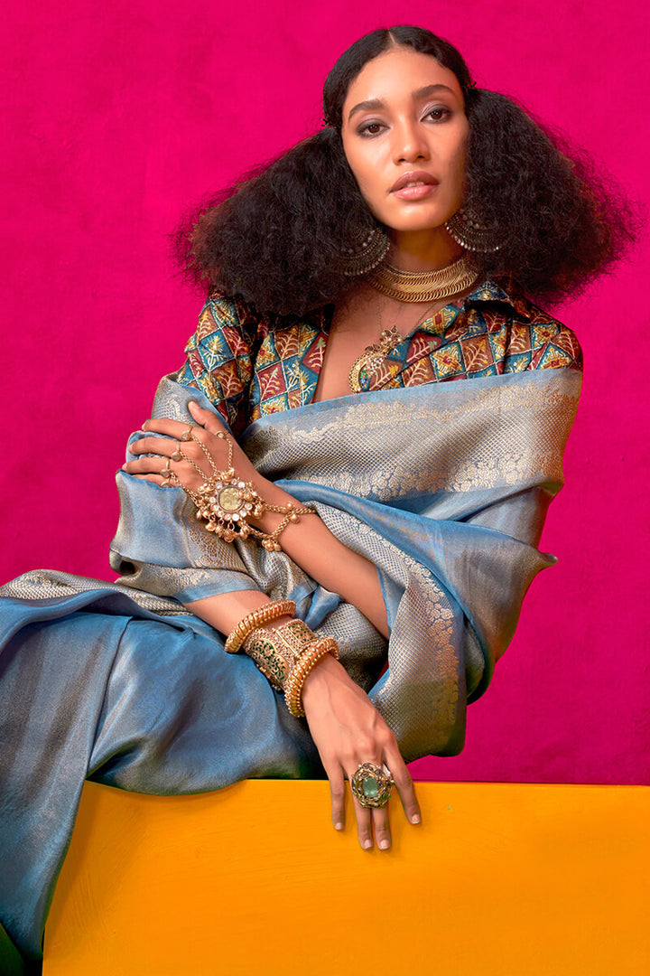 Muted Blue Tissue Silk Saree With Embroidery Blouse Piece