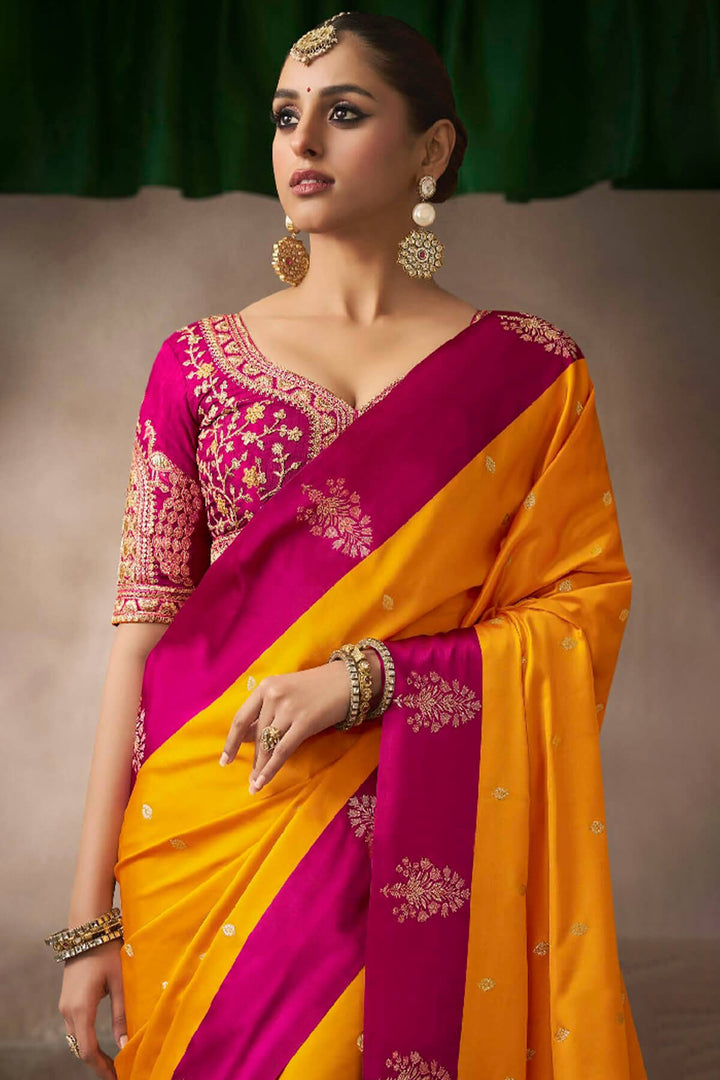 Orangey Yellow Zari Woven Satin Silk Saree With Heavy Embroidery Blouse Piece