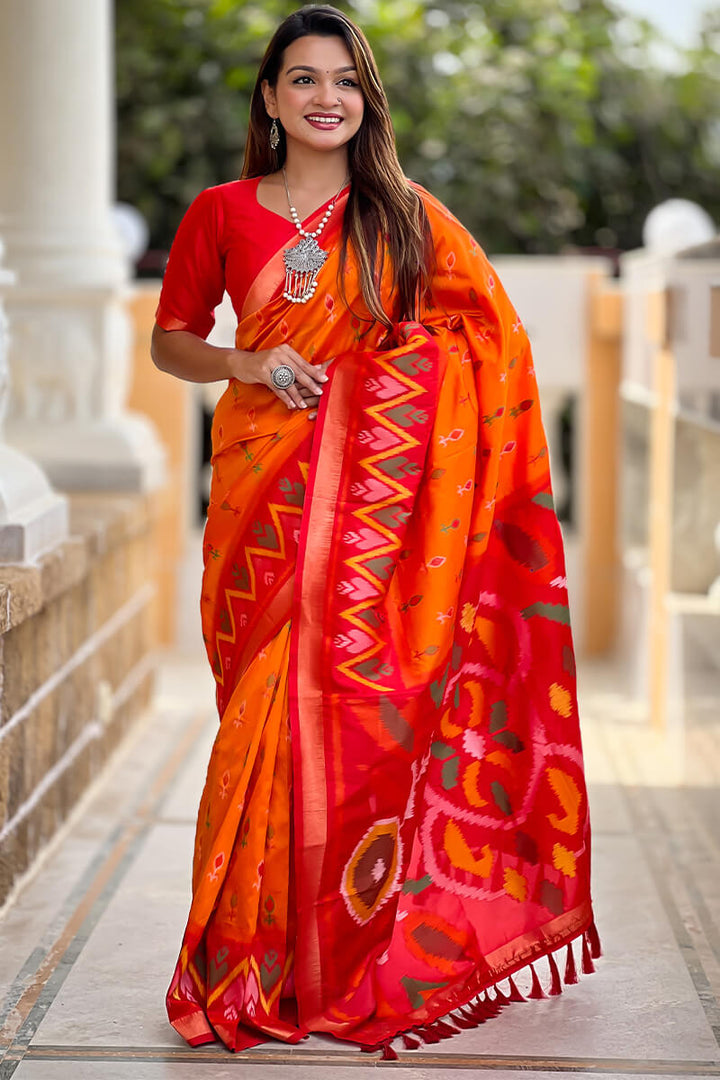 Pumpkin Orange Ikkat Weaving Soft Silk Saree