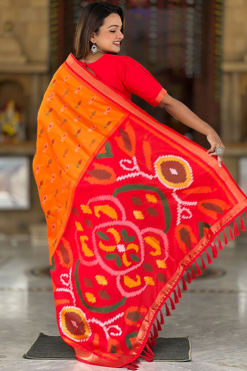 Pumpkin Orange Ikkat Weaving Soft Silk Saree