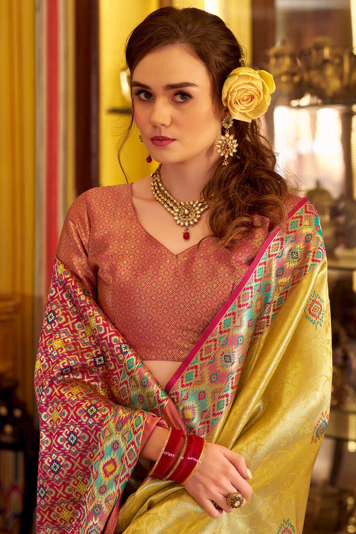 Arylide Yellow Patola Tissue Silk Saree