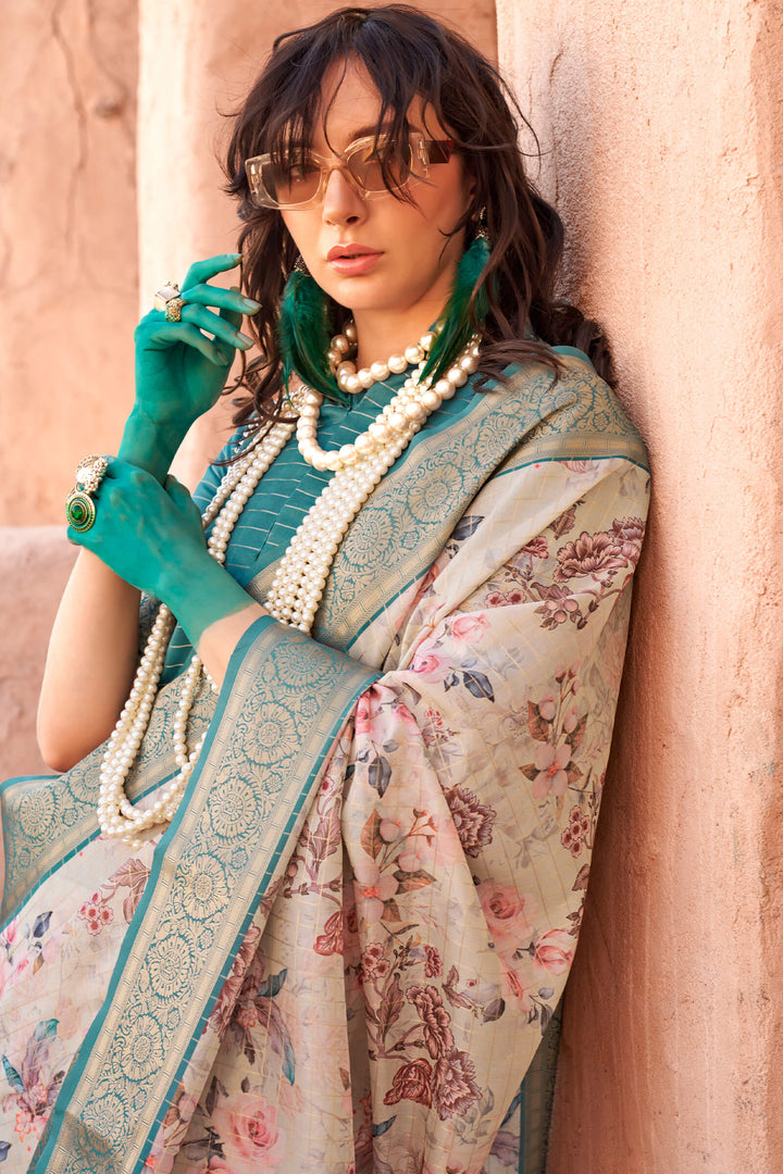 Beige and Turquoise Zari Woven Printed Georgette saree