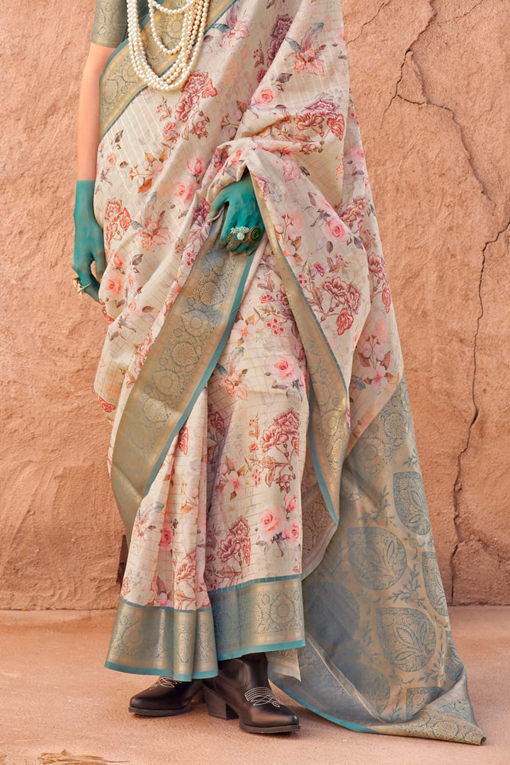 Beige and Turquoise Zari Woven Printed Georgette saree