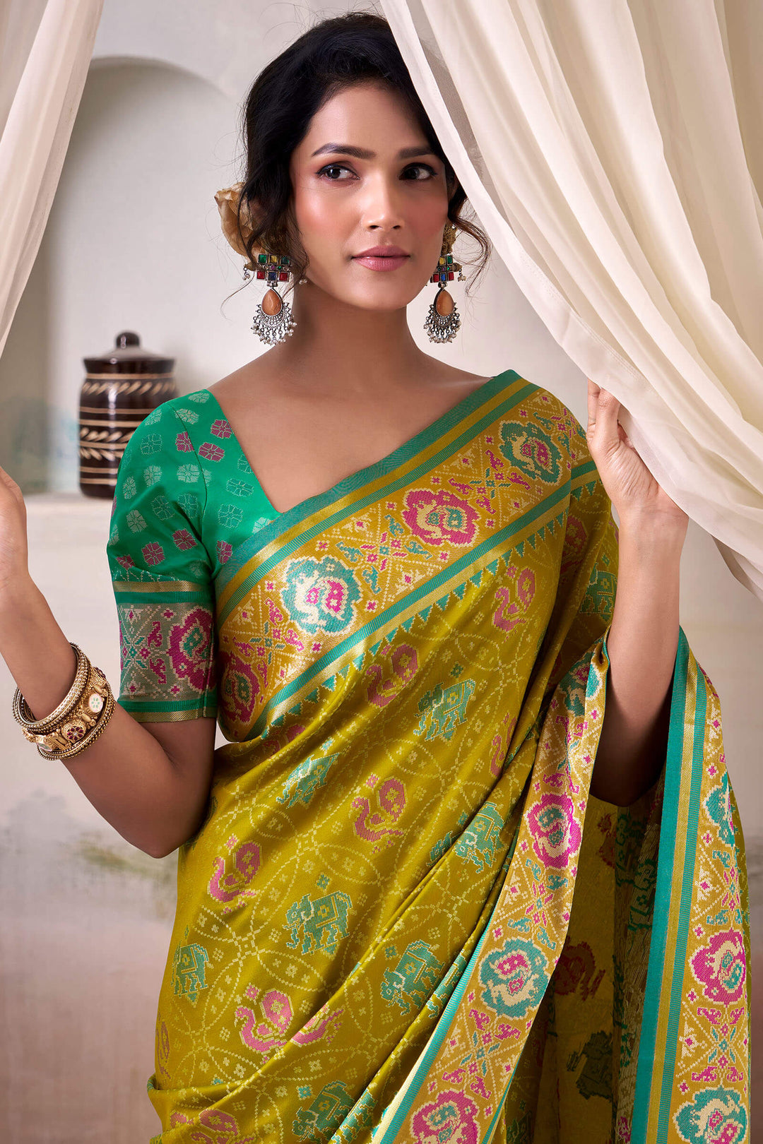 Dark Mustard Zari Woven Patola Silk Saree