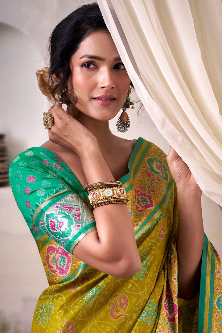 Dark Mustard Zari Woven Patola Silk Saree