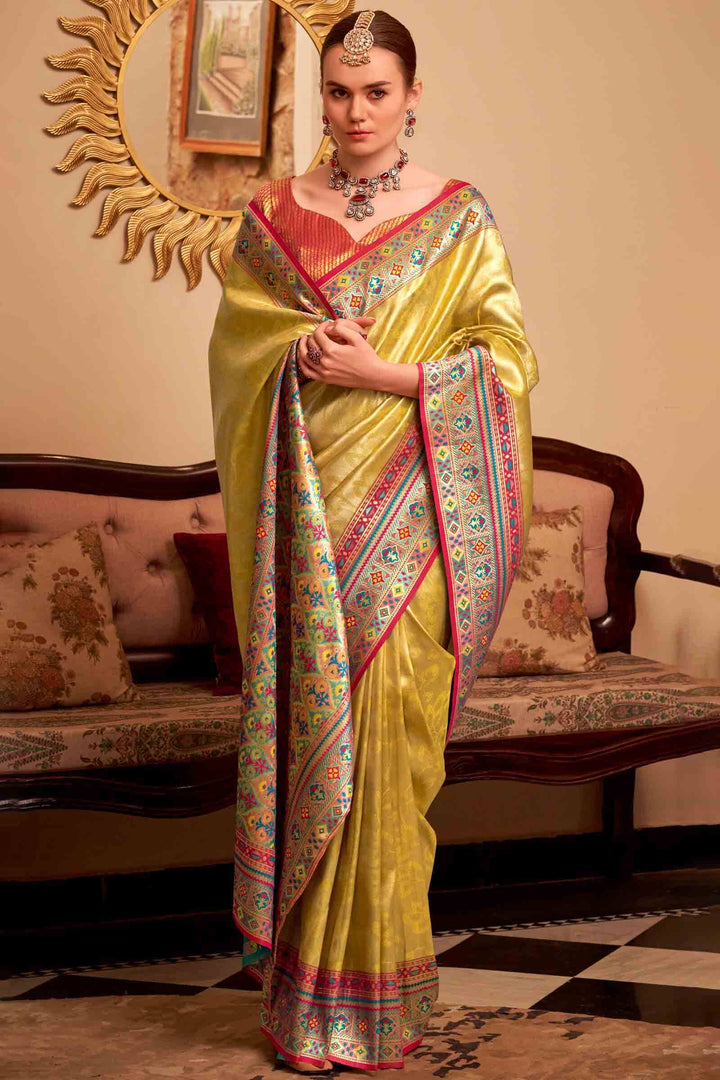 Dull Yellow Banarasi Tissue Silk Saree