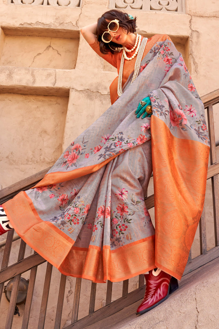 Grey and Orange Zari Woven Printed Georgette saree