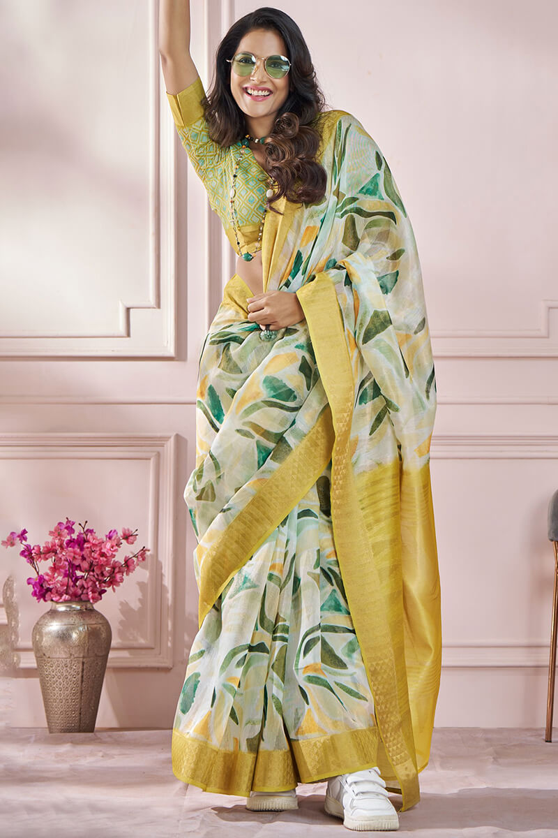 Muddy Yellow Zari Woven Printed Soft Silk Saree