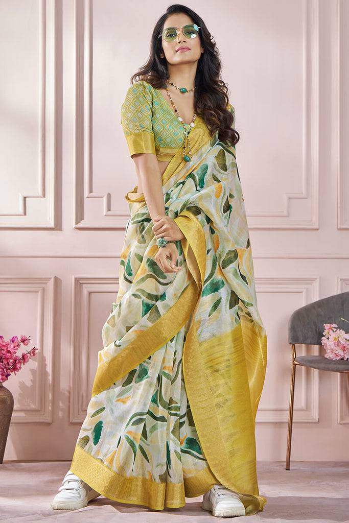 Muddy Yellow Zari Woven Printed Soft Silk Saree