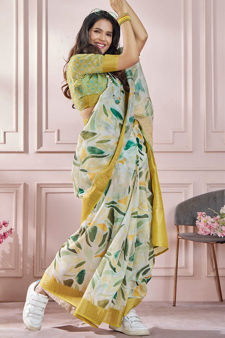 Muddy Yellow Zari Woven Printed Soft Silk Saree