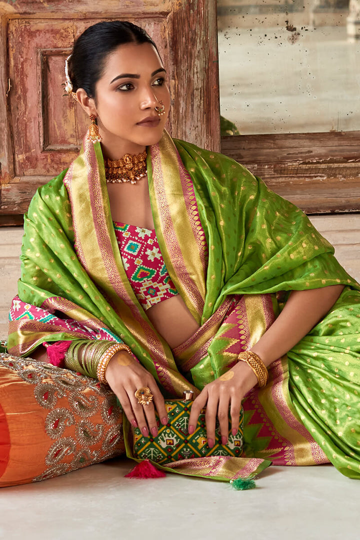 Murky Green Banarasi Tissue Silk Saree