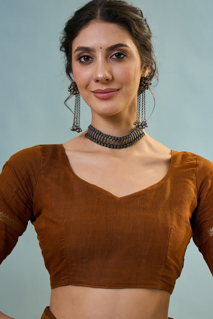 Mustard Brown Printed Cotton Saree with Zari Woven Border