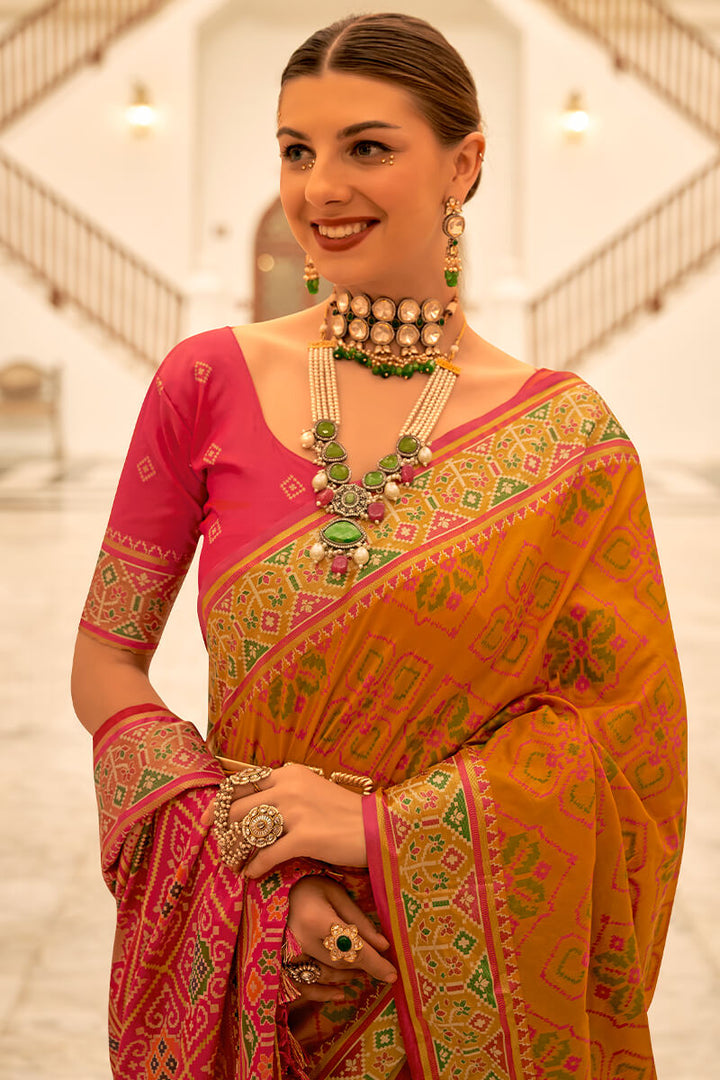 Orangey Yellow Woven Patola Silk Saree