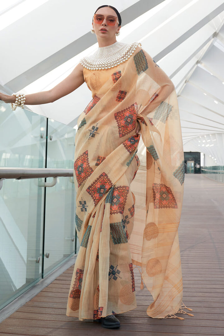 Pale Peach Zari Woven Printed Tissue Silk Saree