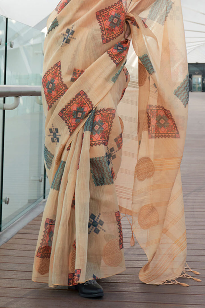 Pale Peach Zari Woven Printed Tissue Silk Saree