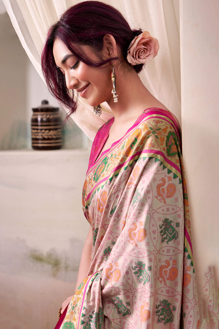 Pale Pink Zari Woven Patola Silk Saree
