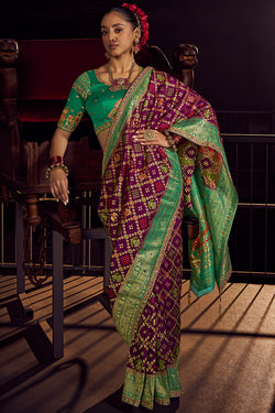 Plum Purple Pure Viscose Dola Silk Saree With Embroidery Blouse