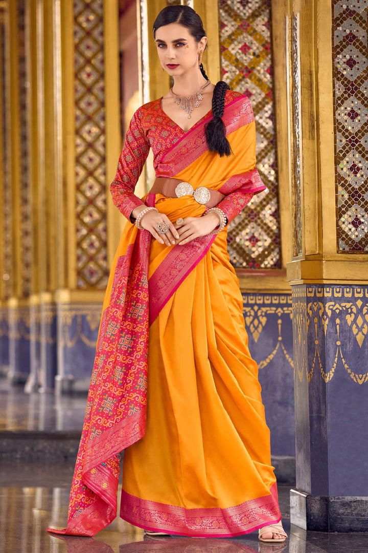 Pumpkin Orange Zari Woven Soft Silk Saree