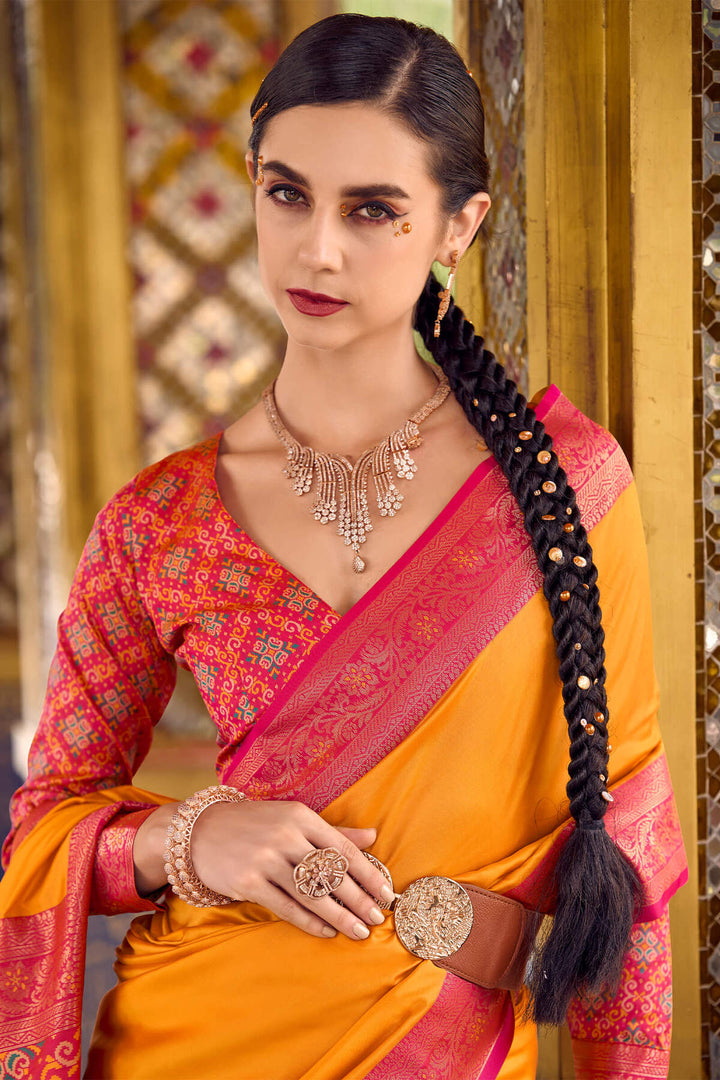 Pumpkin Orange Zari Woven Soft Silk Saree