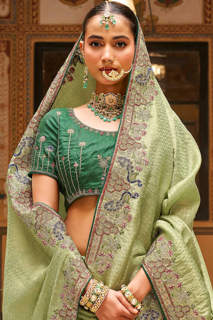 Tan Green Embroidery Work Tissue Silk Saree