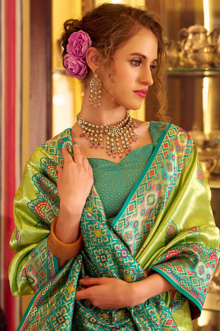 Trendy Green Patola Tissue Silk Saree