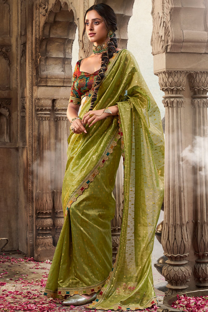 Trendy Green Pure Tissue Silk Saree with Multicolor Lace Border