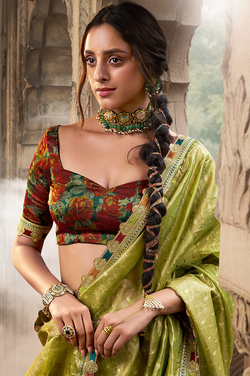 Trendy Green Pure Tissue Silk Saree with Multicolor Lace Border