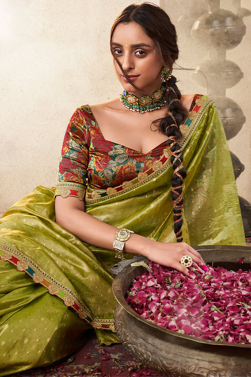 Trendy Green Pure Tissue Silk Saree with Multicolor Lace Border