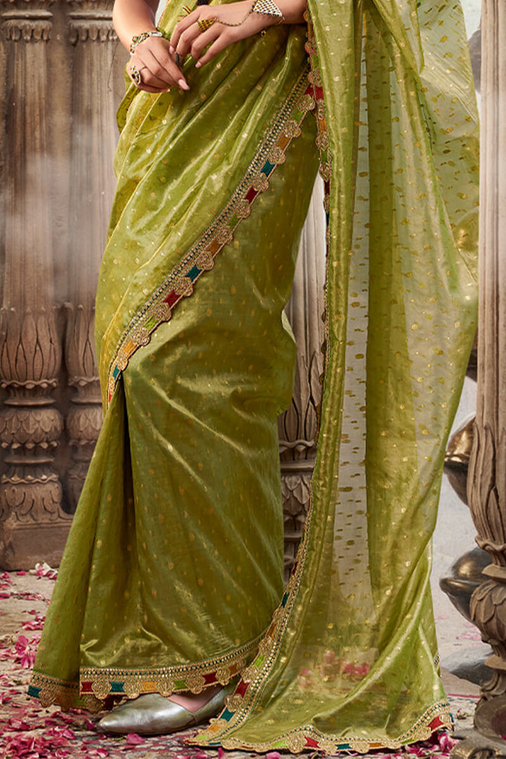 Trendy Green Pure Tissue Silk Saree with Multicolor Lace Border