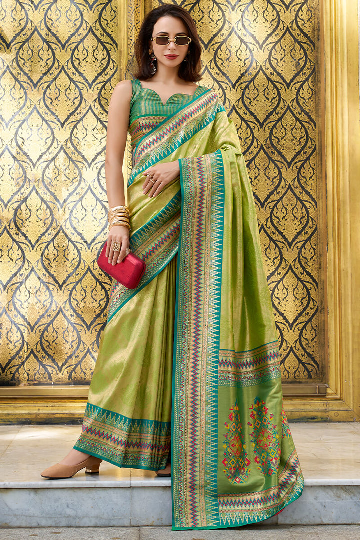 Trendy Green Zari Woven Tissue Silk Saree