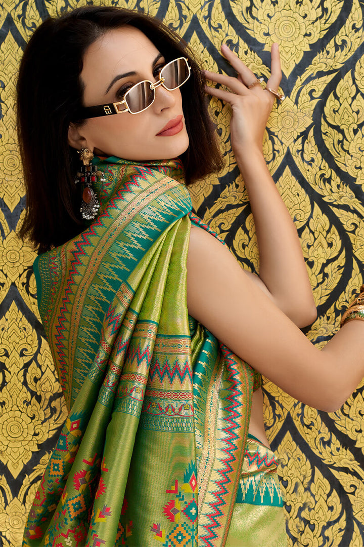 Trendy Green Zari Woven Tissue Silk Saree