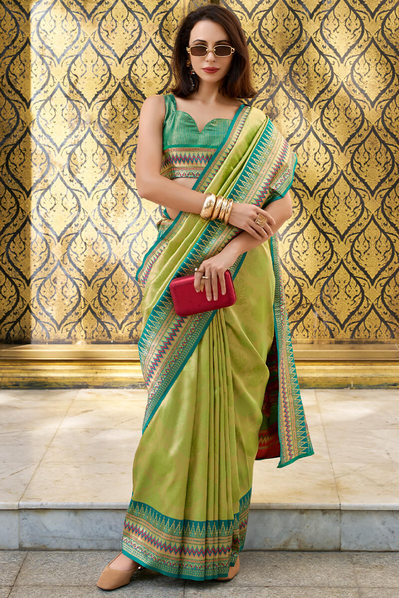 Trendy Green Zari Woven Tissue Silk Saree