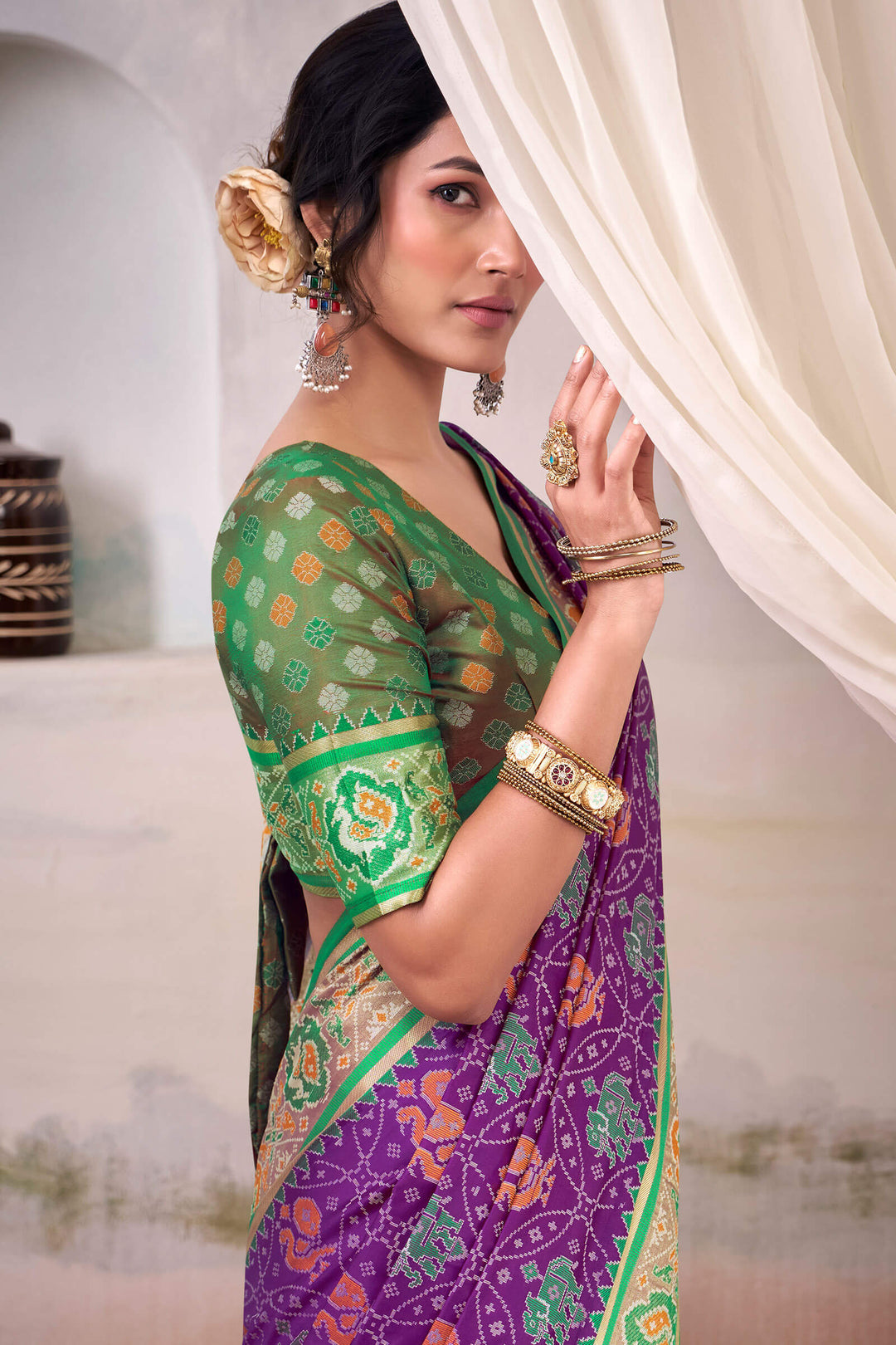 Warm Purple Zari Woven Patola Silk Saree