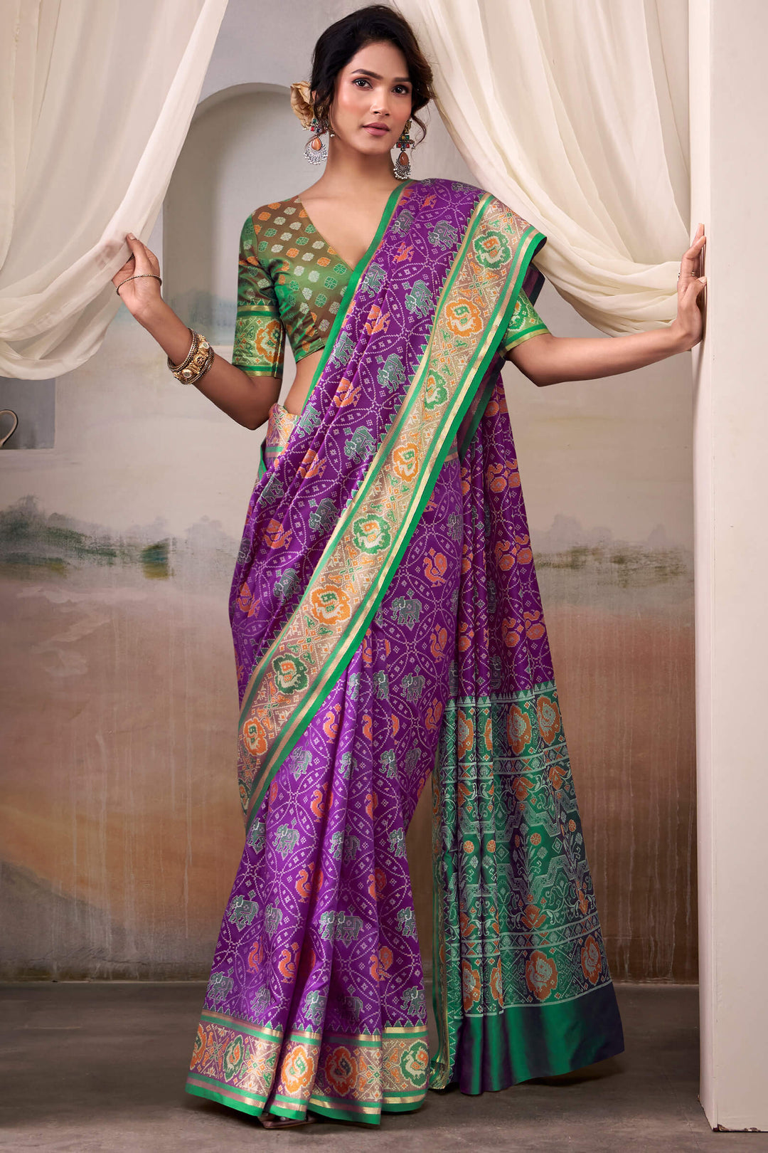 Warm Purple Zari Woven Patola Silk Saree