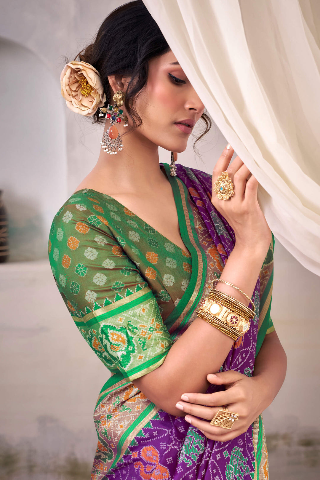 Warm Purple Zari Woven Patola Silk Saree